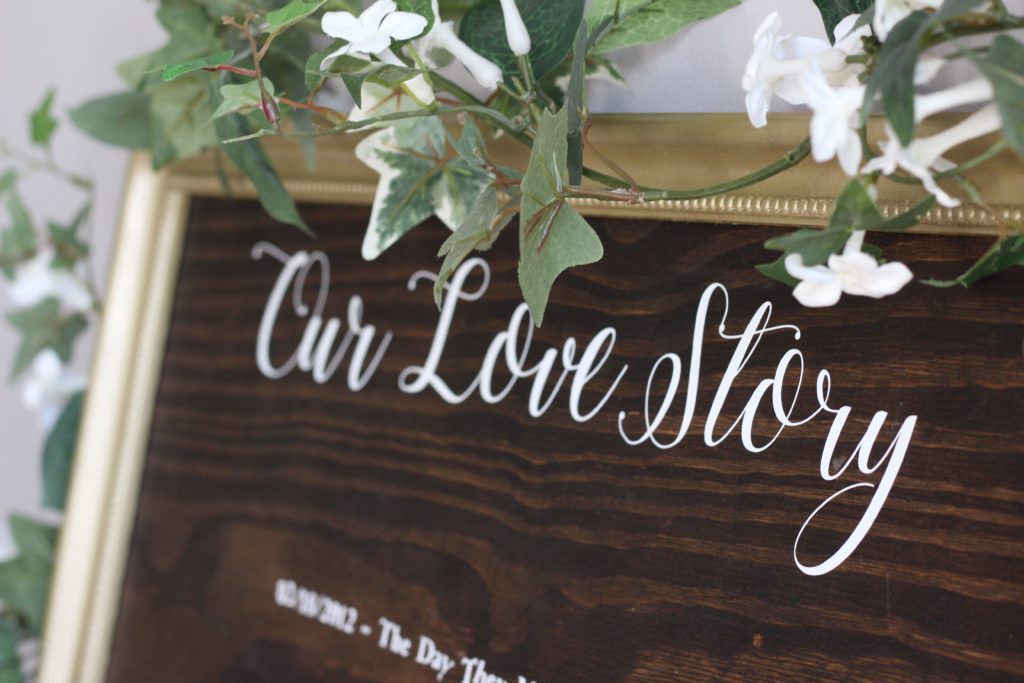 Our DIY Our Love Story sign I made for our wedding