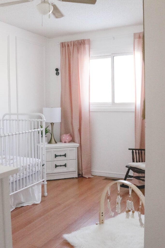 Baby Girl White and Pink Nursery Reveal; White vintage crib, name sign on wall, wainscotting