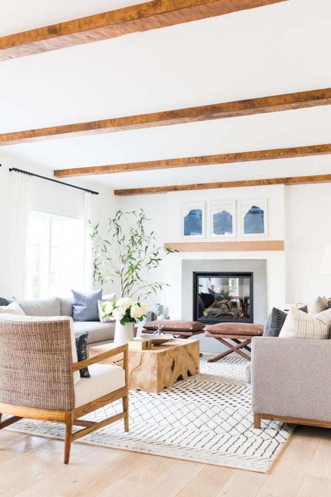 Studio Mcgee living room, wood beams, white fireplace