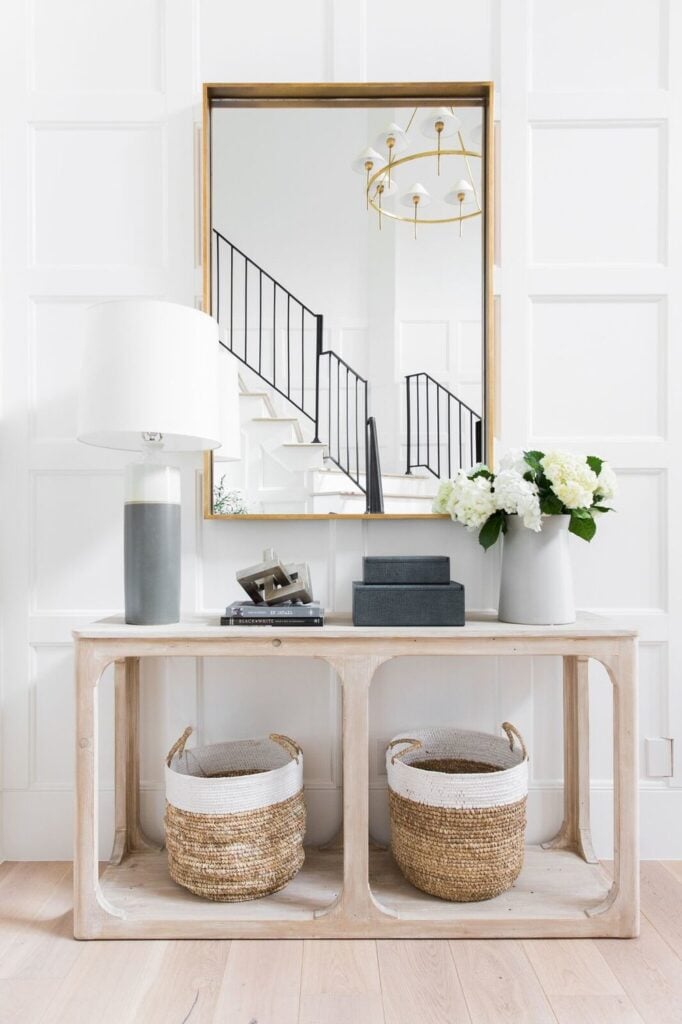 Studio Mcgee living room, accent table, large mirror, woven baskets
