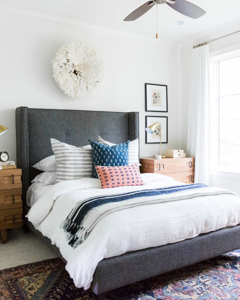 Studio McGee by Bedrooms: Austin Texas Project; dark grey bed; upholstered bed