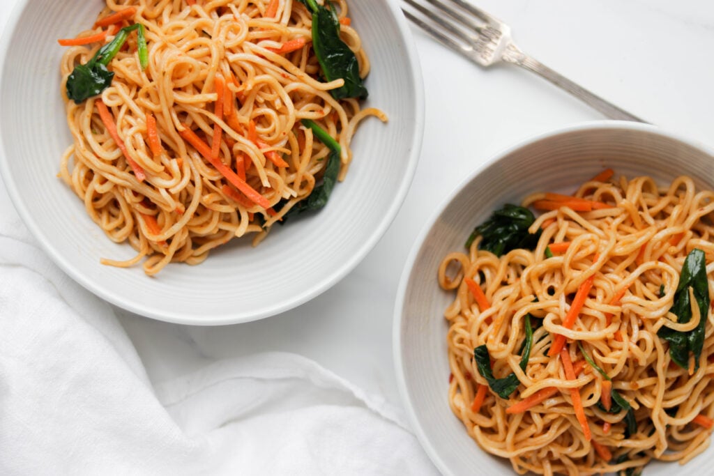 Easy Vegan Noodle Stir Fry is made with fresh vegetables, Tamari sauce, garlic, and spiced up with optional Sriracha sauce. This healthy dish can be made in less then 30 minutes!
