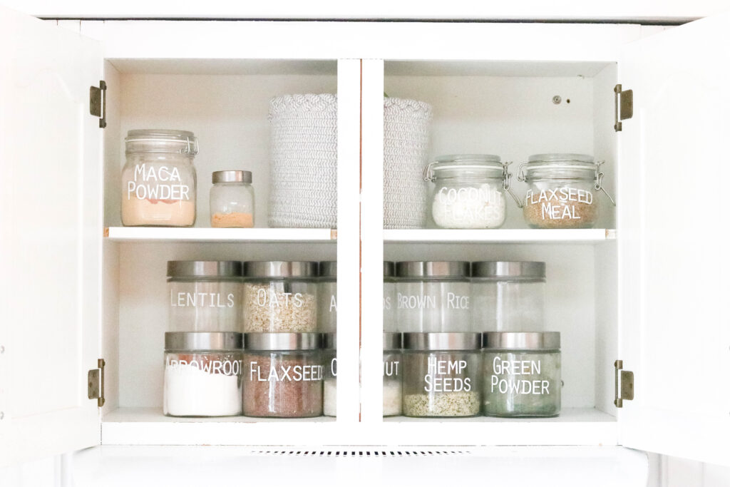 Pantry Organization with Large Labels; after photo organized pantry, clear jar, small jar, silver lid