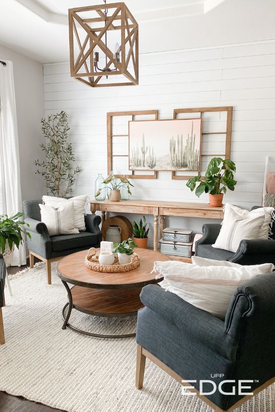 FarmHouse Living Room on a Budget; room with greenery and plants, shiplap wall