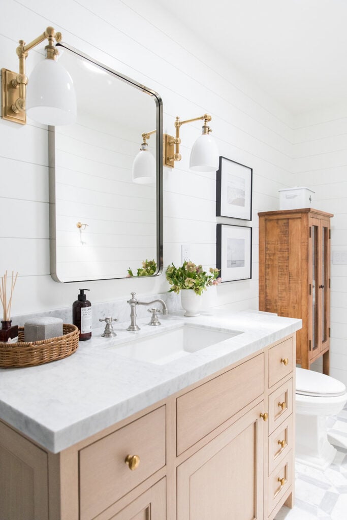 Bathrooms by Studio McGee;  light vanity, oak vanity, pine vanity, antiques, marble counter