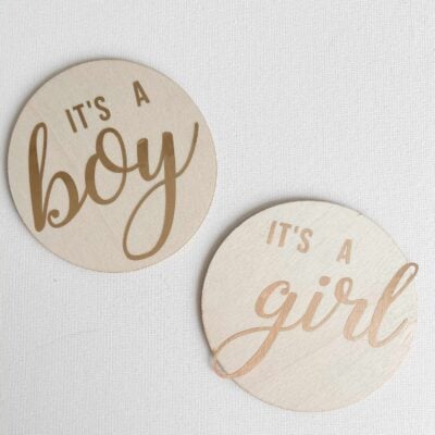 DIY Wooden Birth Announcement Signs; Wood discs with "It's A Boy" and "It's A Girl". Made with Cricut machine but can be made without!