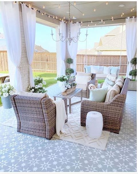 Tips for Styling your Deck this Summer; cozy patio, outdoor pillows, outdoor curtains