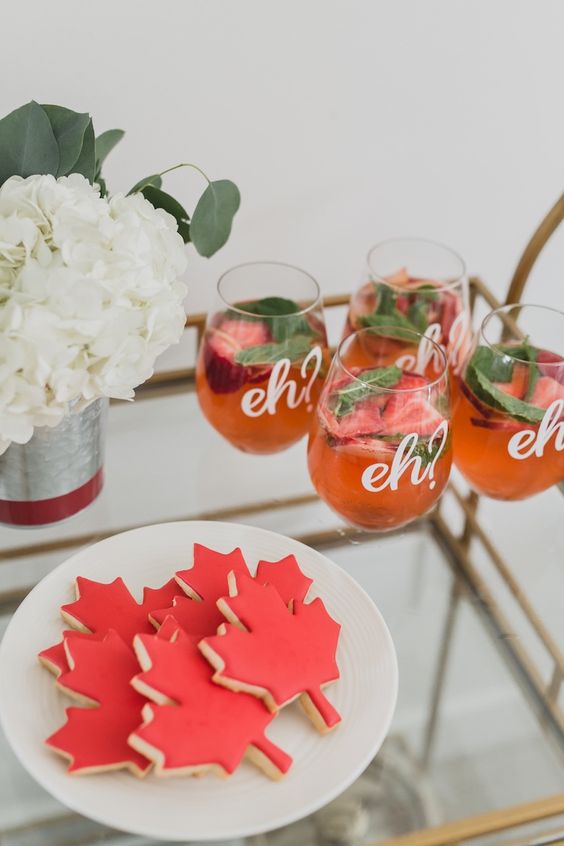 Canada Day Food Ideas: Recipes and Drinks - maple leaf cookies in red, red drinks that say eh on them 