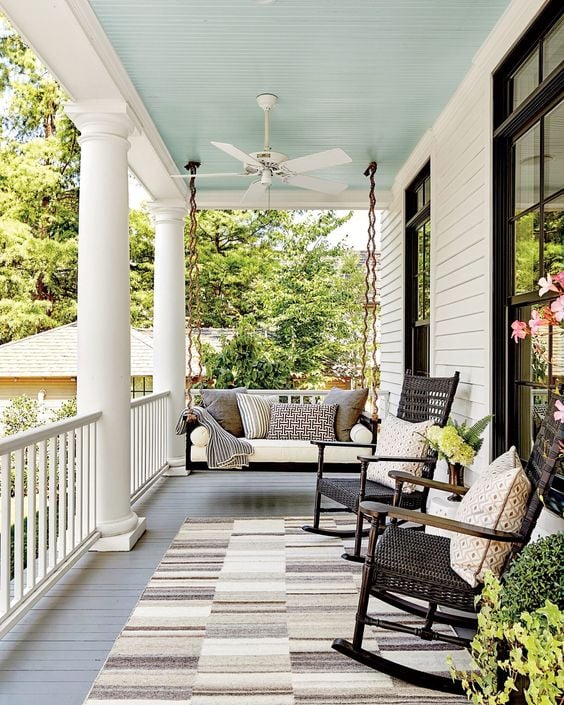 Modern Farmhouse Design Must haves: front porch, swing, sitting area, rocking chairs