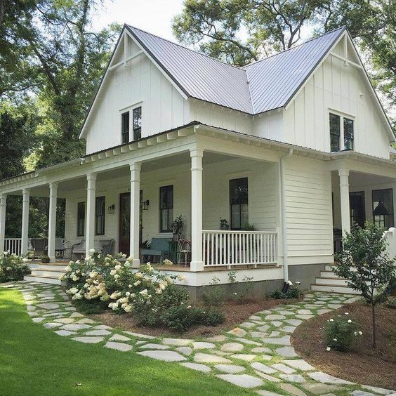 Modern Farmhouse Design Must haves: garden, landscape, stone walkway, stone path, large porch, white siding