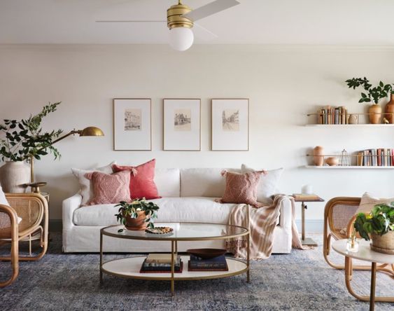 Best NEW Living Rooms by Joanna Gaines from Fixer Upper; blue accents, white couch, farmhouse, vintage