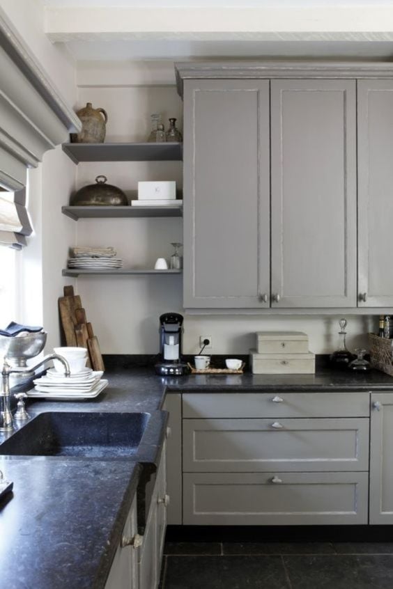 grey cabinets, black countertops - 15 Beautiful Kitchens with Soapstone Countertops; Elegant and durable, soapstone is a favourite material for kitchen countertops. See 15 beautiful kitchens with soapstone countertops here.