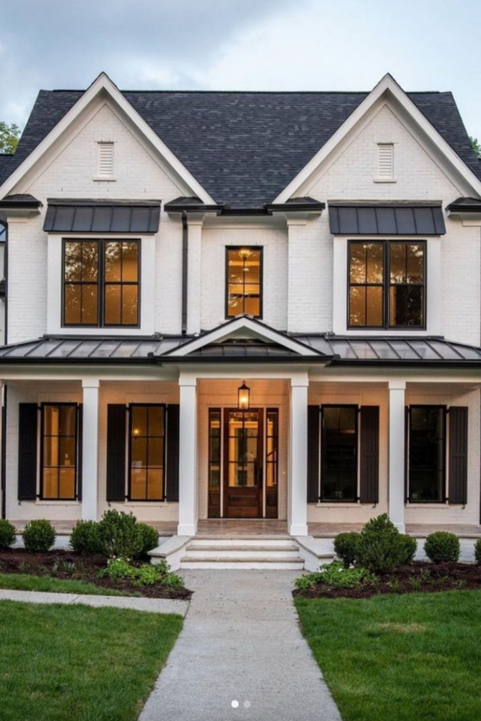 Beautiful Farmhouse Front Porches; black roof, white siding, white brick