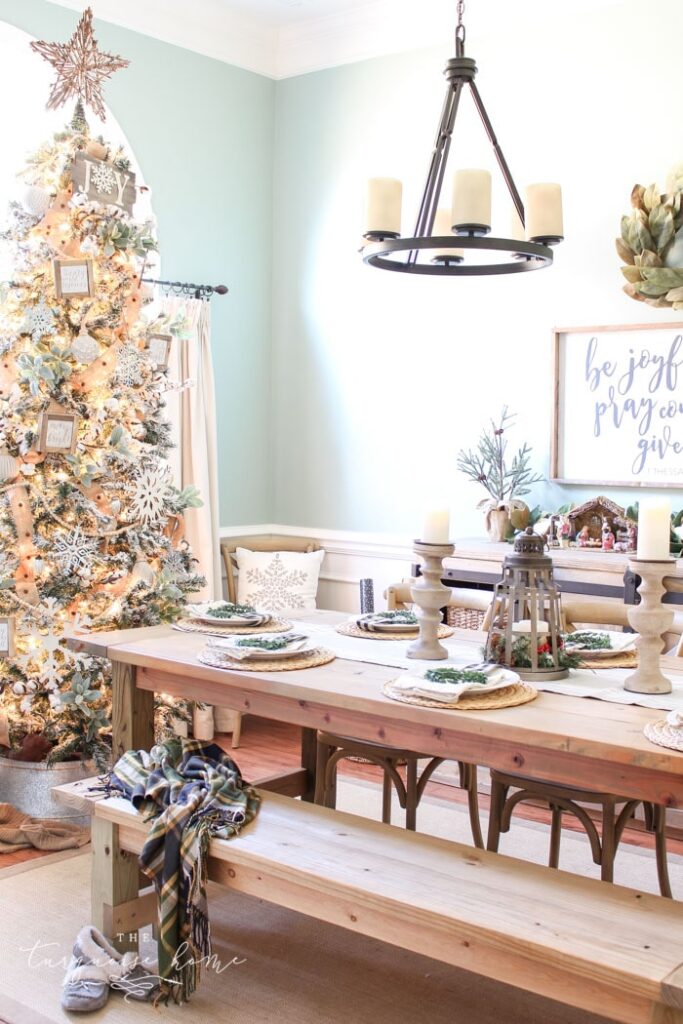 Gorgeous Farmhouse Christmas Table Setting Ideas You'll Want to Copy! - Here are simple yet elegant tablescapes for your to recreate this year! Centerpieces, dishware, lighting and more!