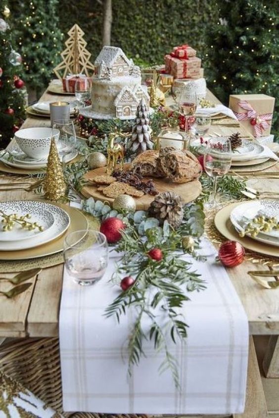 Gorgeous Farmhouse Christmas Table Setting Ideas You'll Want to Copy! - Here are simple yet elegant tablescapes for your to recreate this year! Centerpieces, dishware, lighting and more!