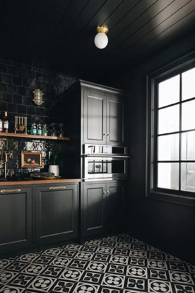 15 Beautiful Black Kitchens That Will Make You Want to Move to the Dark Side; Dark and moody kitchen designs, black kitchen cabinets, dark countertops and black kitchen design inspiration 