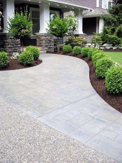 landscaping ideas for front of house, bushes, brown soil, concrete walkways