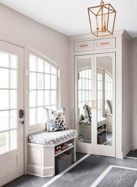 39 Tips to Decorate a Mudroom on a Budget; Learn how to transform your mudroom into a warm and inviting space that you will love!  - mirror in mudroom, mirror on cabinets