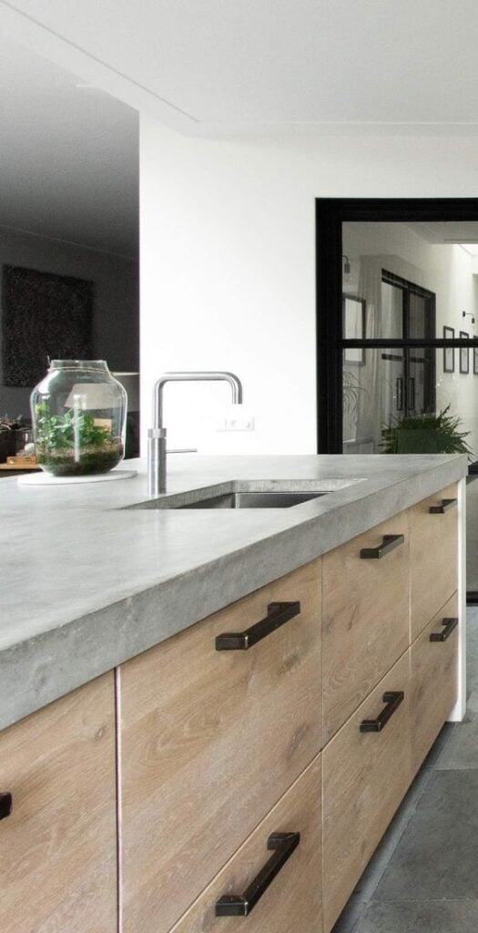 45 Beautiful Kitchens With Concrete Countertops; Explore these stunning concrete kitchen countertops here. {concrete kitchen countertops, kitchens with concrete countertops, poured concrete countertops}