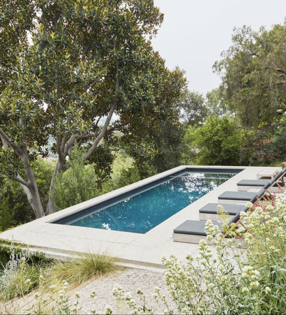 Infinity pool; Beautiful Hillside Pool Ideas with Retaining Walls; pools on hill design with masonry stone retraining wall ideas.