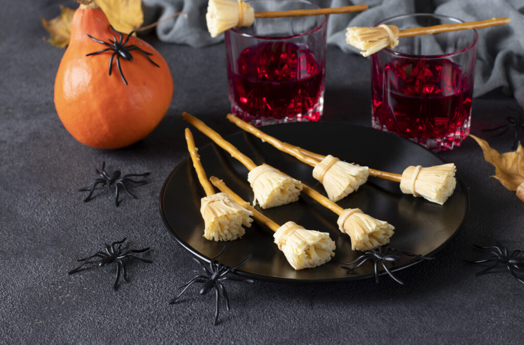 Cheese Broomsticks (Healthy Halloween Snacks); simple kid friendly snack for Halloween using string cheese and pretzels.