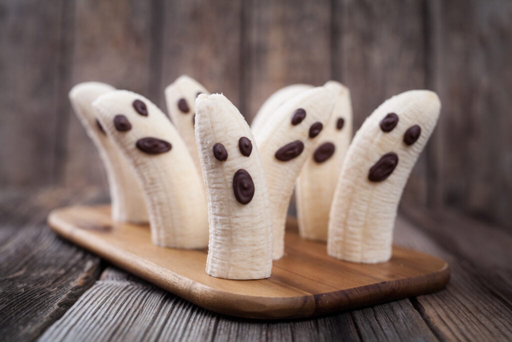 Halloween Banana Ghosts (Spooky Kids Snacks); A fun and scary Halloween snack for kids! Two ingredients, easy and healthy!