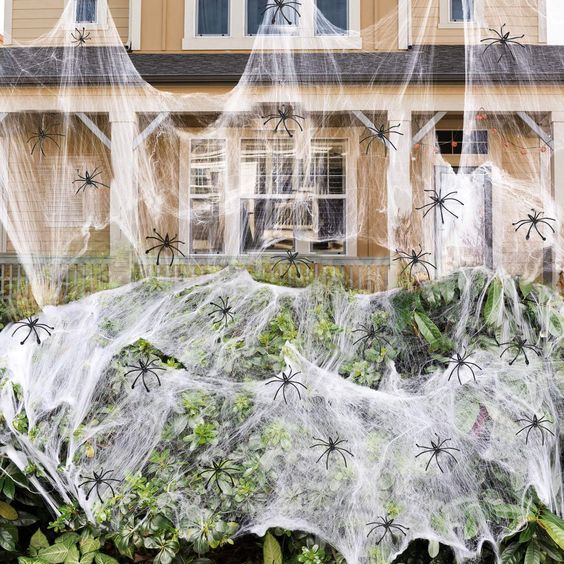 Spider webs, spider web decoration; Outdoor Halloween Decoration Must haves {Halloween Decoration Must haves, halloween decor, halloween decor ideas, decorations for halloween}