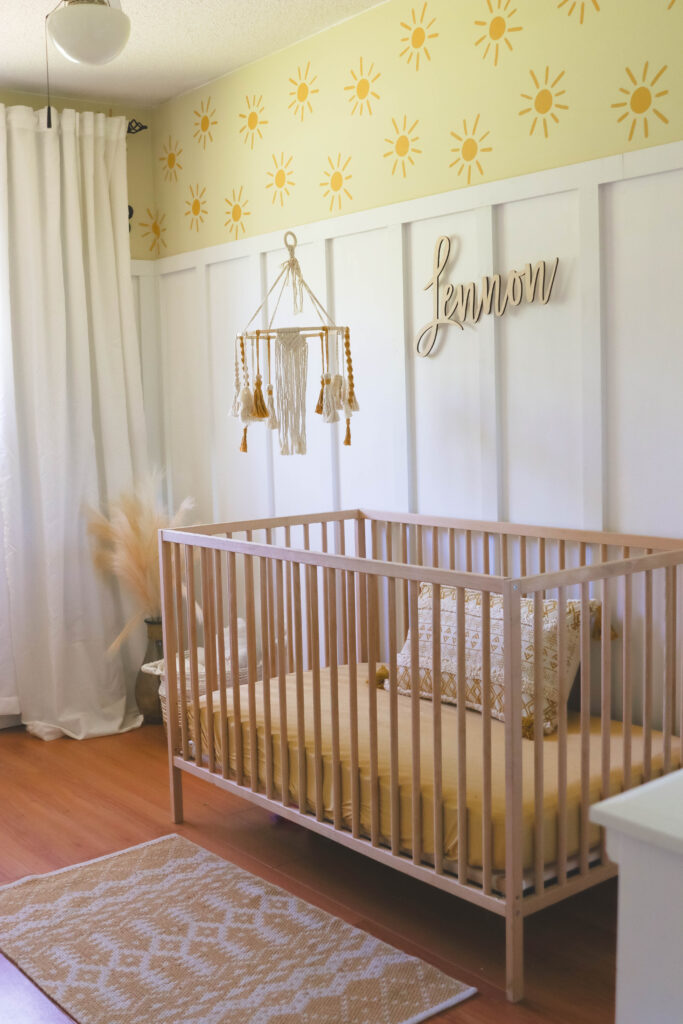 Boho Yellow Nursery with Sunshine Wallpaper (Gender Neutral); our beautiful yellow bohemian nursery design for our daughter! White board and batten, and ruttan textures!
