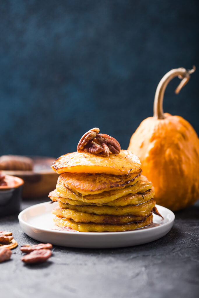 Easy Pecan Pumpkin Pancake Recipe; A delicious twist on your traditional pumpkin pancake recipe, with a sweet and salty pecan kick.
