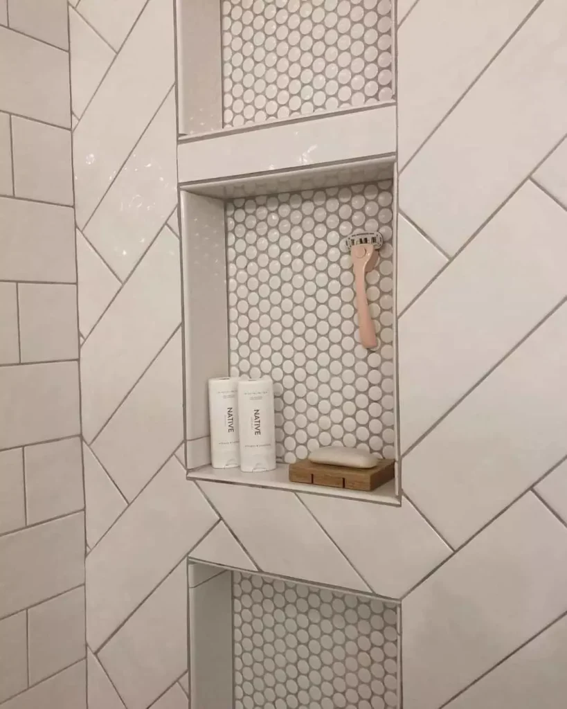Farmhouse shower niche ideas for an organization solution in your bathroom. The perfect place for your shampoos, conditioner and soaps!