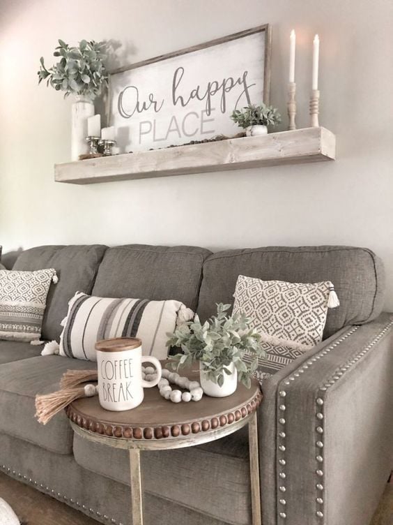 Grey Modern Farmhouse Living Room Ideas; dark grey sofa with antiques