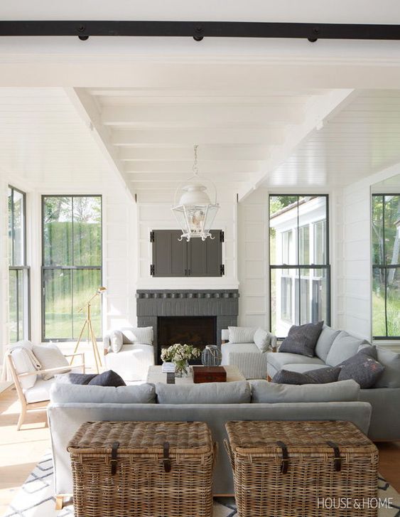 Grey Modern Farmhouse Living Room Ideas; bright white walls and grey sofas