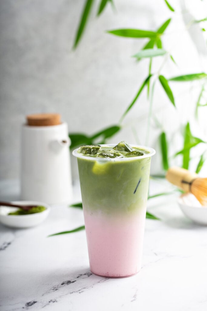 Iced Strawberry Matcha Latte Recipe made with coconut milk, match powder and strawberry puree!