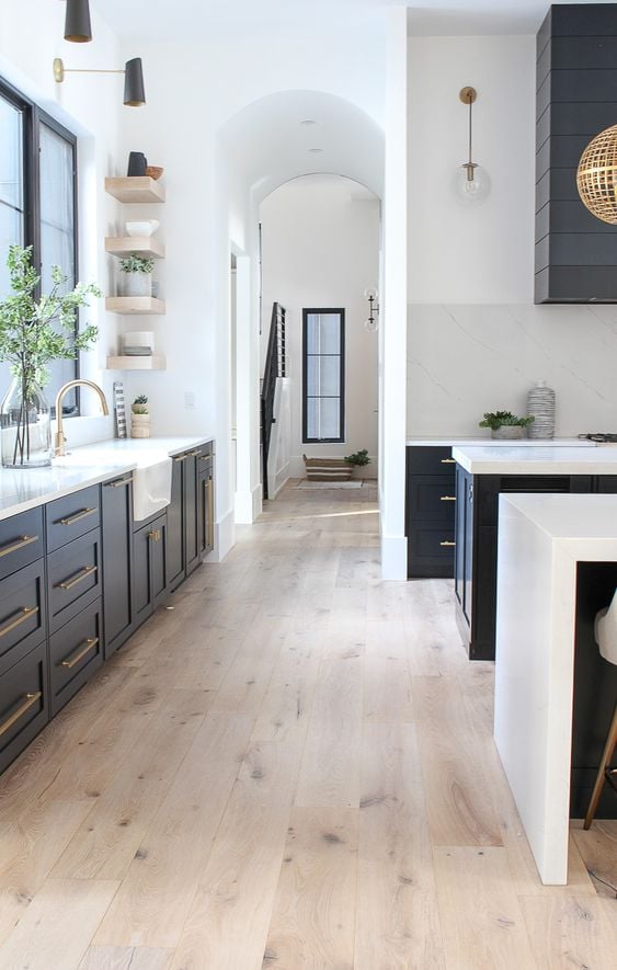 20 BEST Modern Farmhouse Flooring Ideas; lighter wood flooring in the kitchen