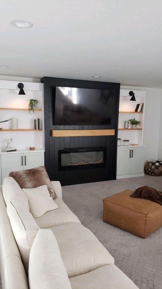 vertical black shiplap on fireplace with built ins