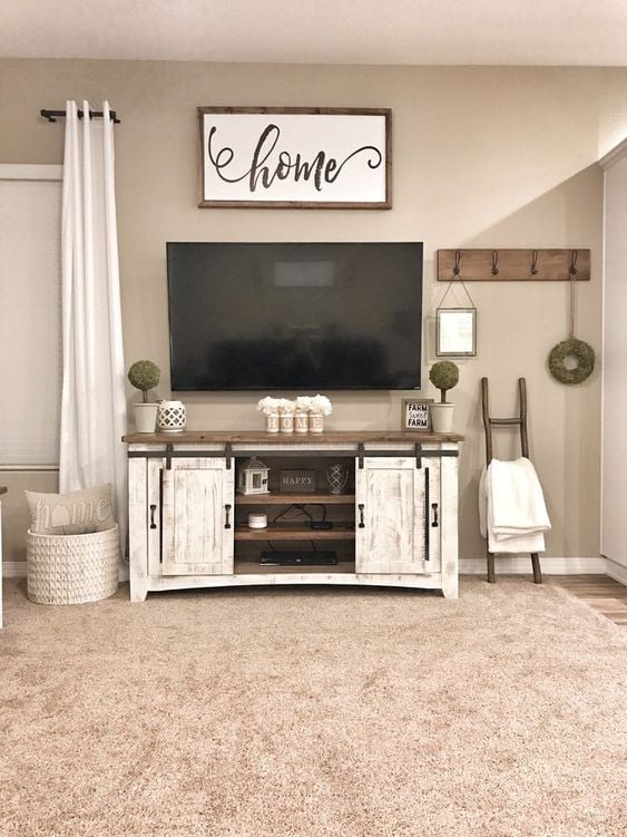 40 TV Stand Decor Ideas to Elevate Your Living Room; Here are ways you can decorate your TV stand to make watching TV that much more enjoyable!