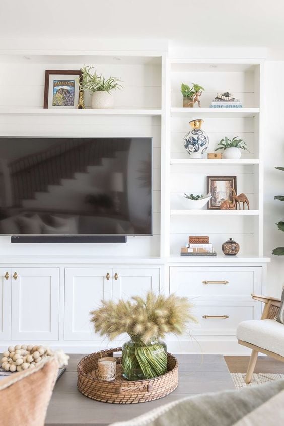 40 TV Stand Decor Ideas to Elevate Your Living Room; Here are ways you can decorate your TV stand to make watching TV that much more enjoyable!