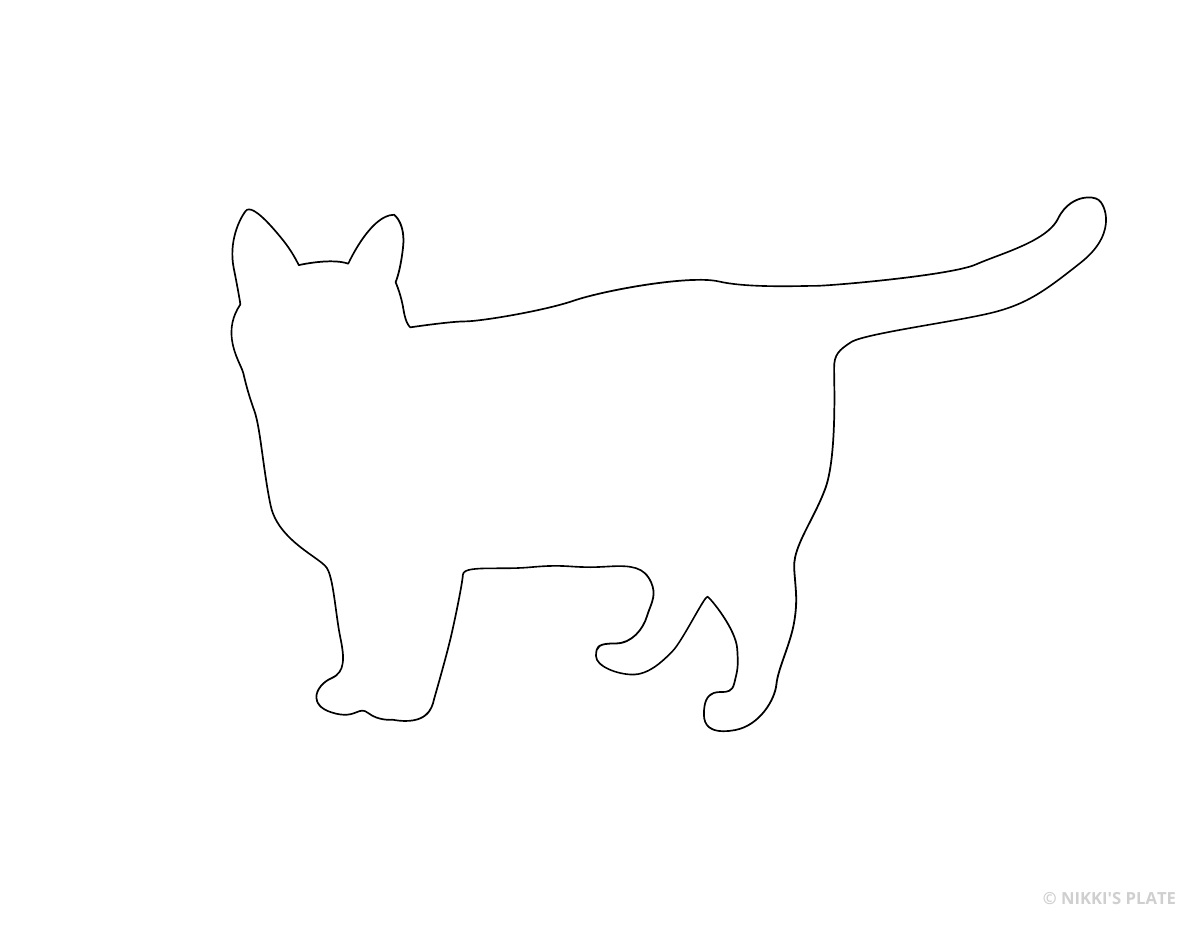 Fluffy standing cat with long tail printable pumpkin stencil outline.