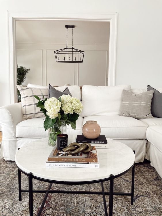 How To Style a Round Coffee Table; a guide to styling a coffee table! Tips and tricks for the perfect round coffee table set up!