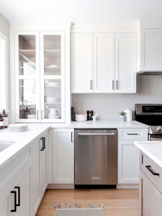 White Cabinets with Black Hardware Kitchen Ideas; white kitchen cabinets with black hardware for a beautifully classic farmhouse kitchen