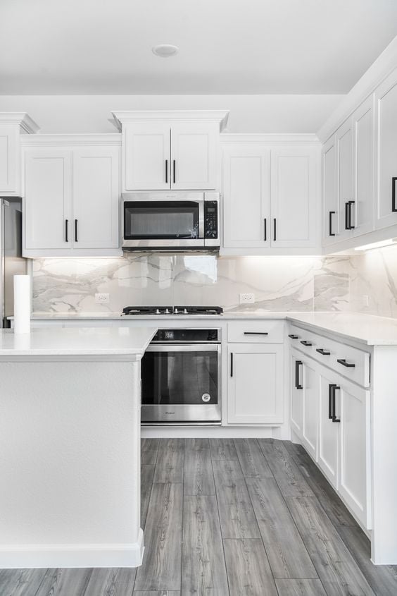 White Cabinets with Black Hardware Kitchen Ideas; white kitchen cabinets with black hardware for a beautifully classic farmhouse kitchen