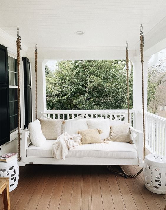 Here are 25 farmhouse porch swings for a welcoming and cozy entry way! All the farmhouse porch swing ideas you need in one place!