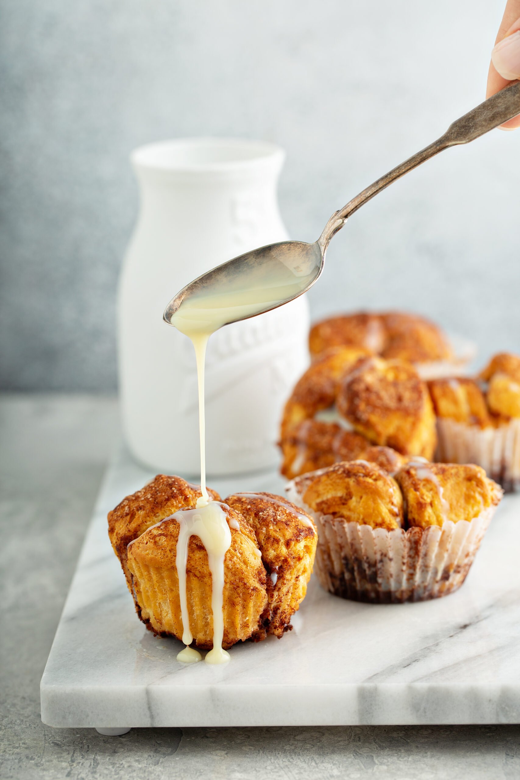 Cinnamon Monkey Bread Muffins Recipe; these sweet and fluffy pull apart muffins, bursting with cinnamon flavors will be one your family asks for every holiday season!