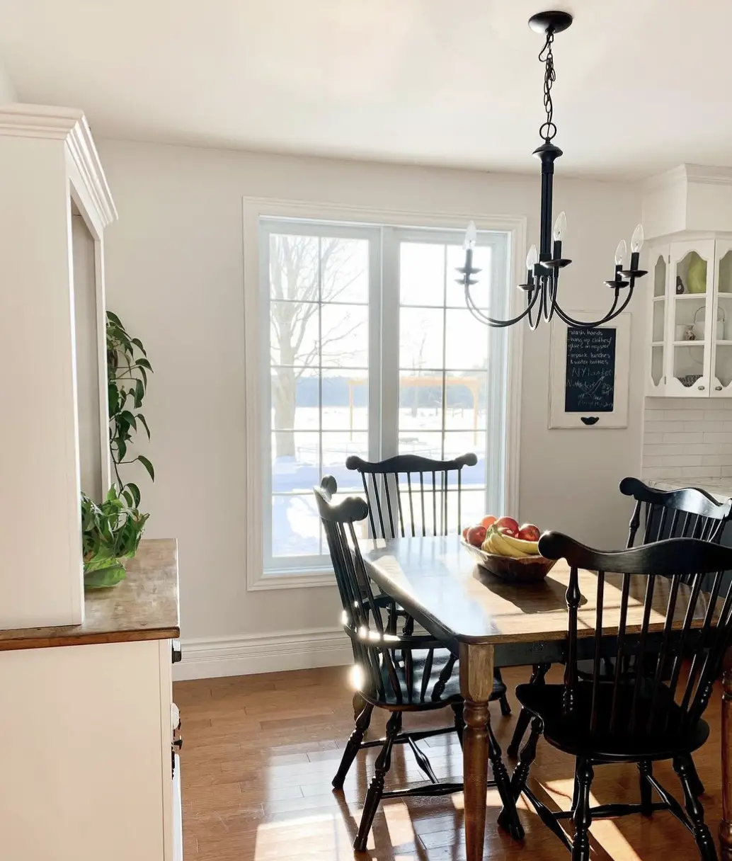 Kitchen with Benjamin Moore Calm Paint Color Review; a warm off-white grey with a very subtle undertone of purple for the perfect airy yet calming look.