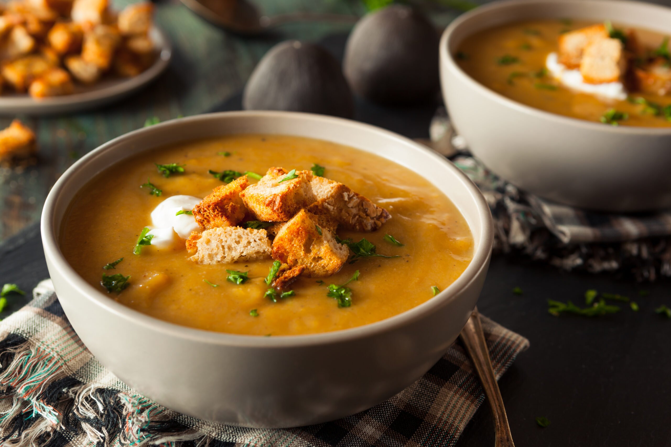 Easy Butternut Squash Soup Recipe; this creamy soup recipe is perfect for any cold day! Vegan and dairy free! Serve with bread for the ultimate experience.