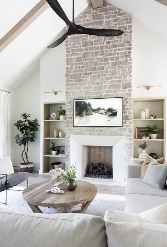 Fireplace Ideas With TV Above; Enjoy the warmth next to a burning fire while watching your favourite movie or show with these living room ideas!