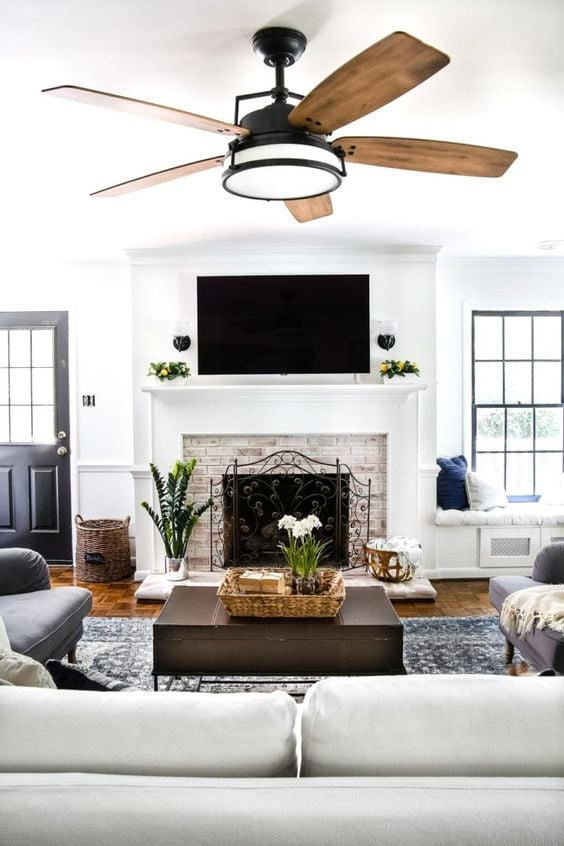 Fireplace Ideas With TV Above; Enjoy the warmth next to a burning fire while watching your favourite movie or show with these living room ideas!