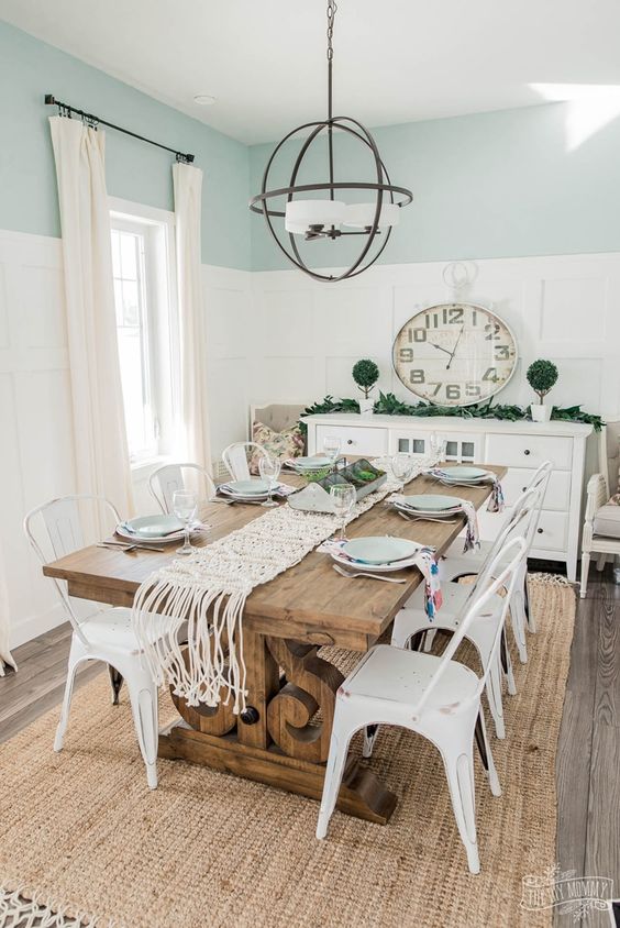 Tips to Design a Beautiful Dining Room Around a Farmhouse Table; Here are some helpful tricks to use when designing your rustic farmhouse dining room!