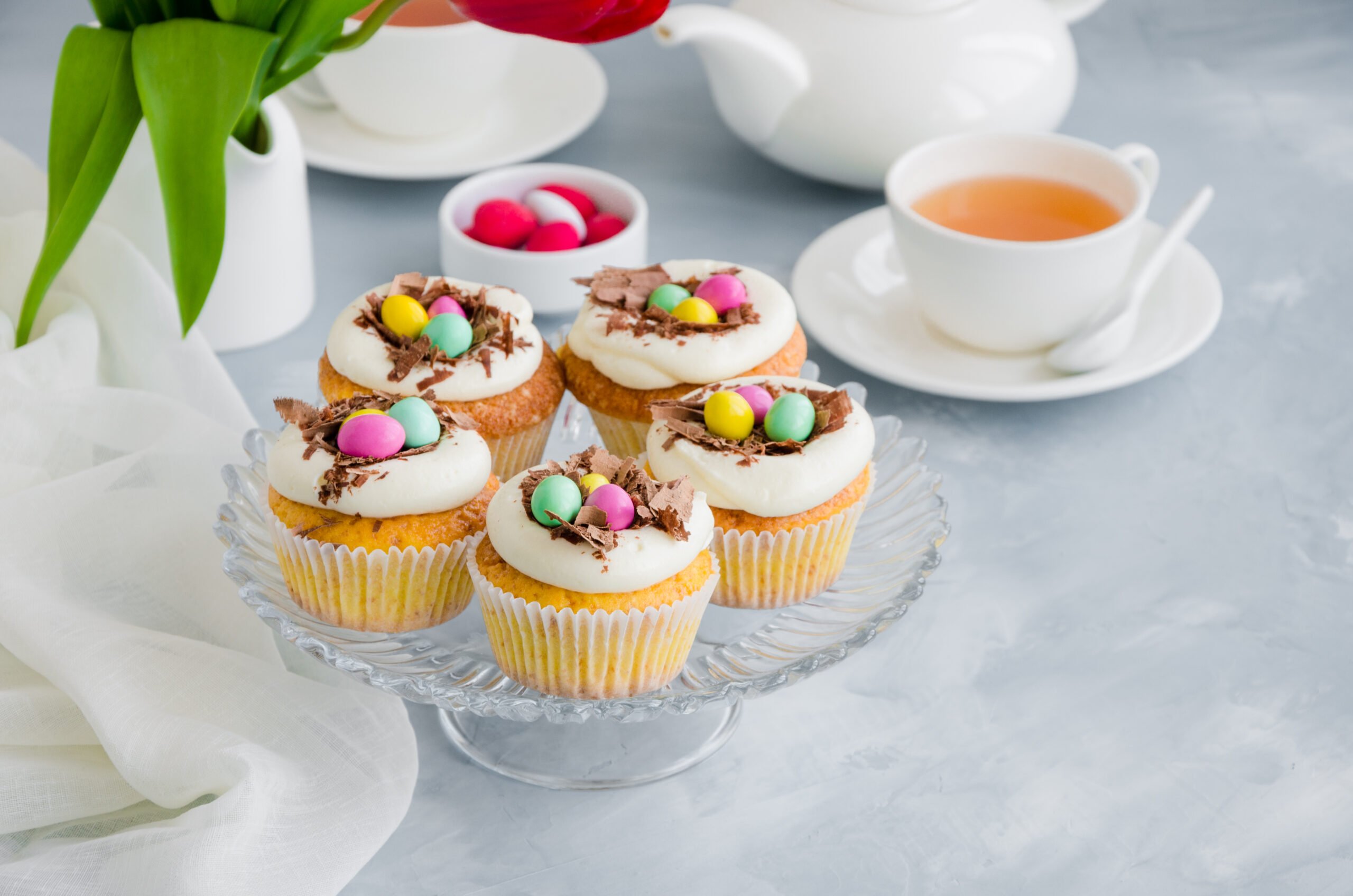 Easter Birds' Nest Vanilla Cupcakes - Easter Birds' Nest Vanilla Cupcakes Recipe; a fun Easter dessert recipe. Delicious fluffy vanilla cupcakes topped with Cadbury mini eggs and shaved chocolate!