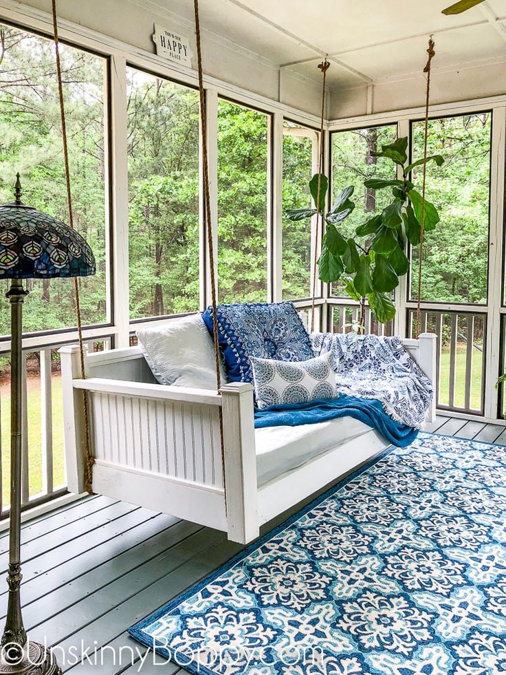 Screen Porch Ideas On A Budget; A screen porch provides a place to cool off in the shade during the heat of the summer. These inexpensive screen porch ideas on a budget will help you transform your deck into a cool spot where you can relax.